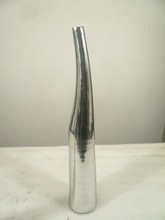 polished aluminium vase