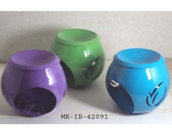 Iron Metal Aroma Oil Burner, for Decorative, Feature : Easy To Clean, High Efficiency Cooking, Light Weight