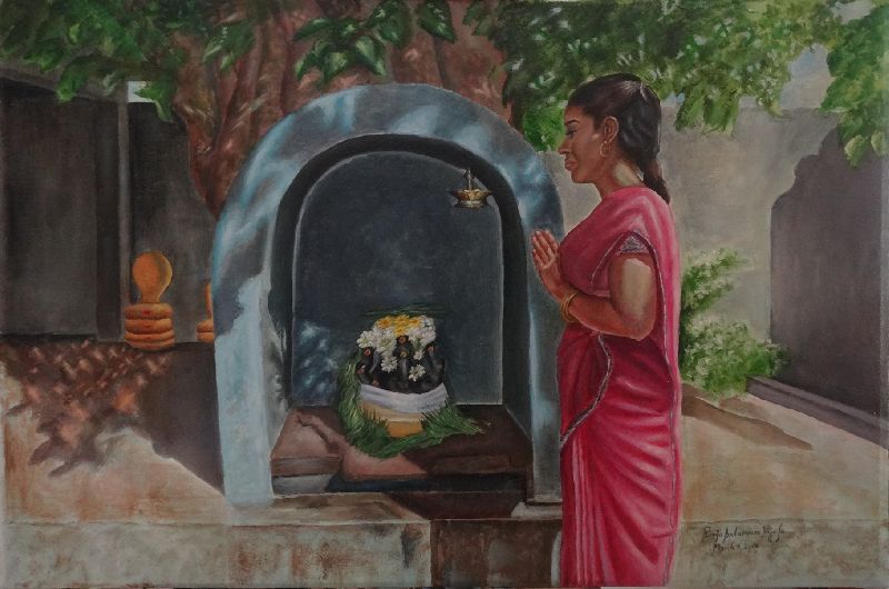 A woman praying to Pillaiyar