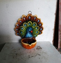 Paraffin Wax Peacock designer diya, for Parties, Feature : India tradetional