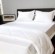 white hotel bed sheet