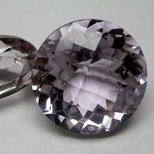 faceted round checkerboard cut pink amethyst gemstone