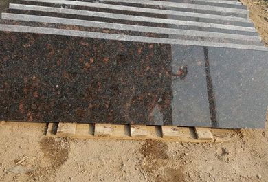 Polished Tan Brown Granite Tile, for Hotel Slab, Kitchen Slab, Office Slab, Restaurant Slab, Size : 12x12ft