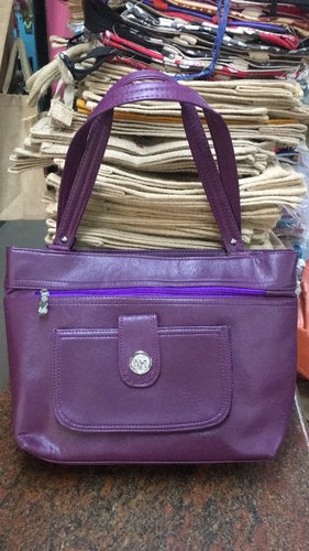 Plain Leather Ladies Purple Handbag, Specialities : Fashionable, Shiny Look, Stylish