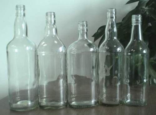 Liquor glass bottle, Feature : Eco Friendly, Fine Finished, Good Quality, Perfect Shape, Transparent