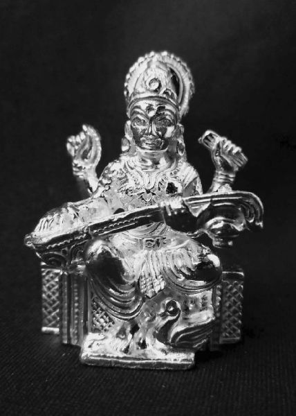 Polished Silver Saraswati Idol, for Shops, Office, Home, Feature : Fine Finishing, Attractive Design