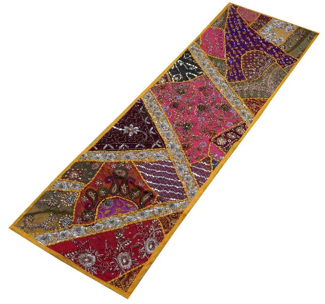 Yellow table top runner wall hanging