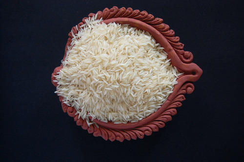 Common 1509 Steam Basmati Rice, for Cooking, Human Consumption, Variety : Long Grain, Medium Grain