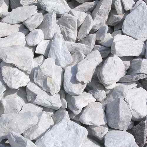 Mineral Calcined Dolomite Stone, for Industrial, Form : Lumps