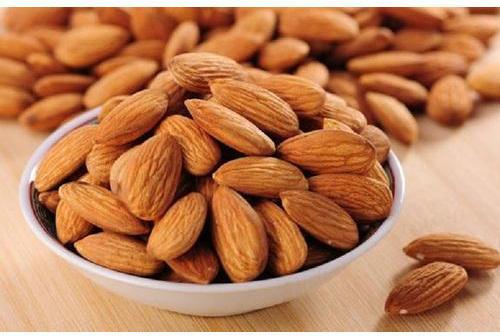 Hard Organic Brown Almonds Nut, for Milk, Sweets, Style : Dried