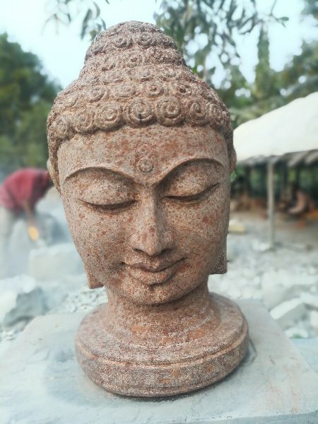 Buddha head  statue in sand stone