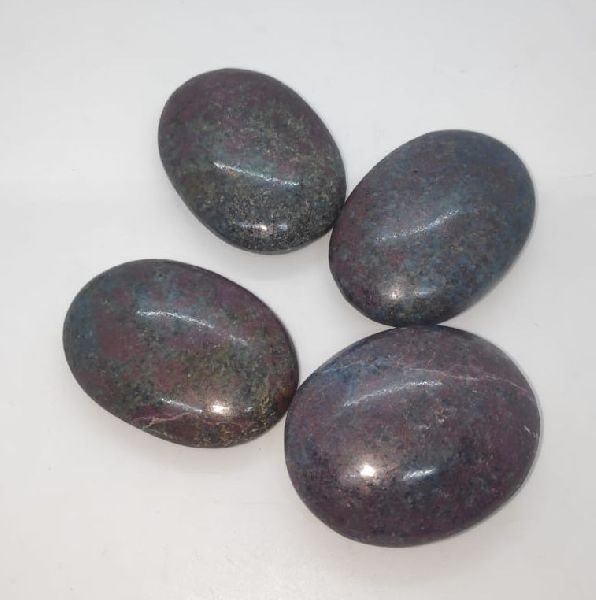 Oval Polished Ruby Kyanite Palm Stone, for Jewellery, Feature : Durable