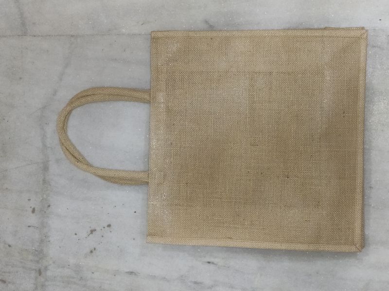 LAMINATED NATURAL JUTE BAG   .