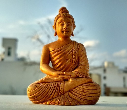 Non Polished Sandalwood Buddha Statue, Color : Brown, Orange, Red, Yellow