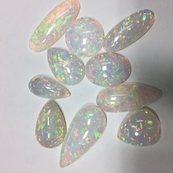 Polished Ethiopian Opal Gems Stone, for Jewellery, Feature : Fine Finished, Hard Structure, Shiny Look
