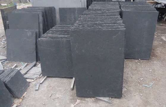Rectangular Hand Cut Black Limestone Slabs, for Construction, Feature : Acid Resistant, Heat Resistant