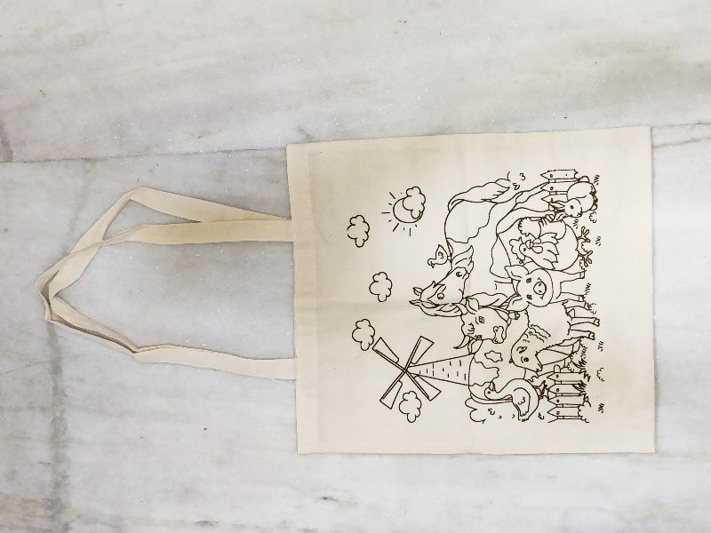 BLACK PRINTED COTTON BAG WITH SELF HANDLE