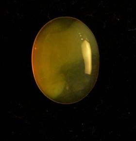 Oval 9.35 Carat Honey Opal Stone, for Jewellery, Feature : Long Life