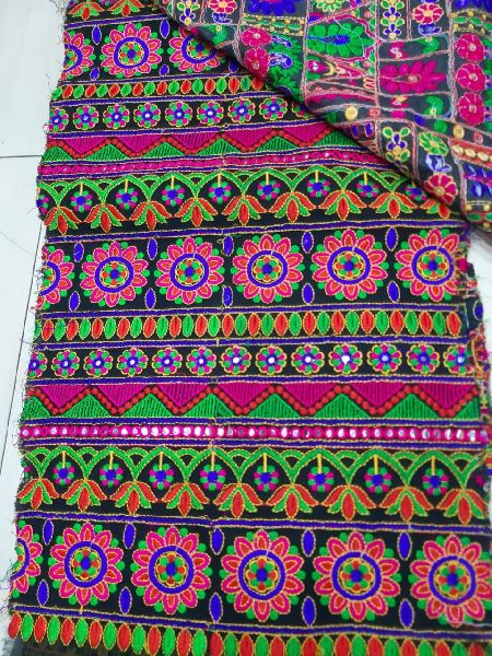 Kutch Embroidery Fabric, for Garments, Feature : Attractive Look