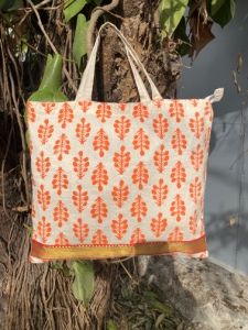 Orange Wildflower Cotton Carry Bag With Zip Closure