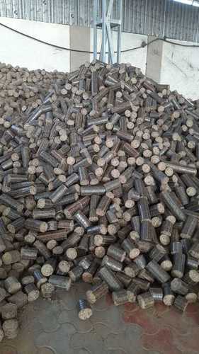 Cylindrical Wooden Briquettes, for Industrial, Feature : Easy To Burn, High Quality
