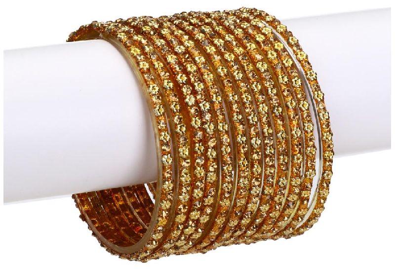 Polished Golden Glass Bangles, Feature : Attractive Designs