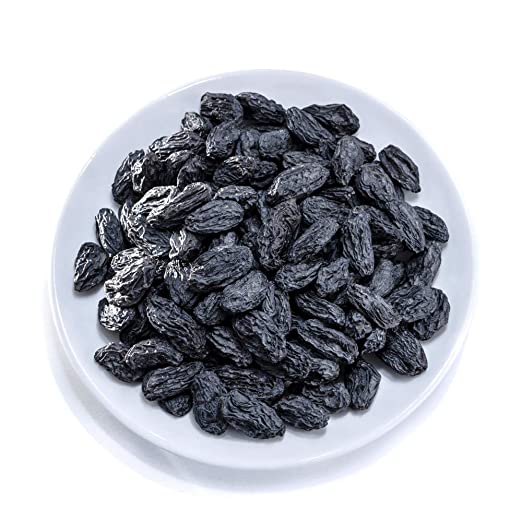 Elongated black raisins, Taste : Sweet