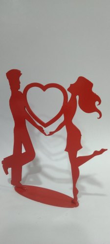 Couple Holding Heart Figurine