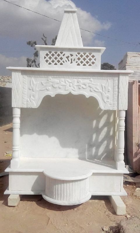 a white indian marble pooja temple