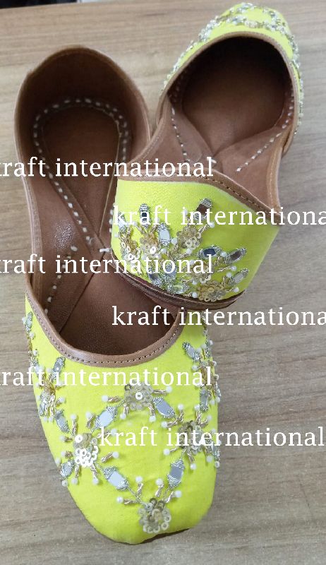 Kraft International Embroidered yellow beaded leather juttis, Gender : Female