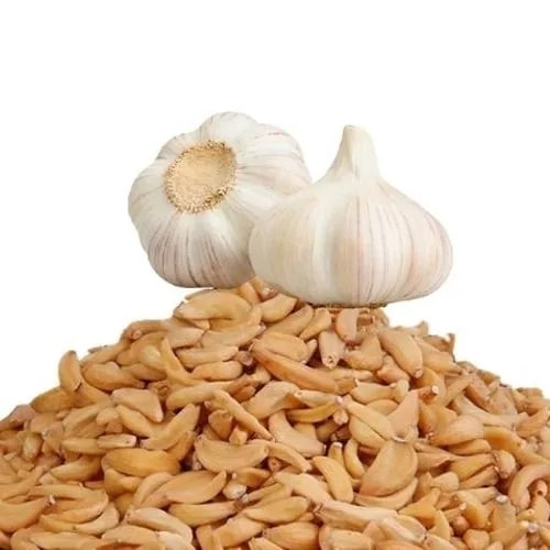Dehydrated Garlic Flakes, for Cooking, Grade : Food Grade
