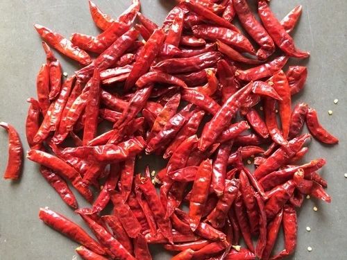 Whole Stemless Dry Red Chilli, for Spices, Cooking, Certification : FSSAI Certified