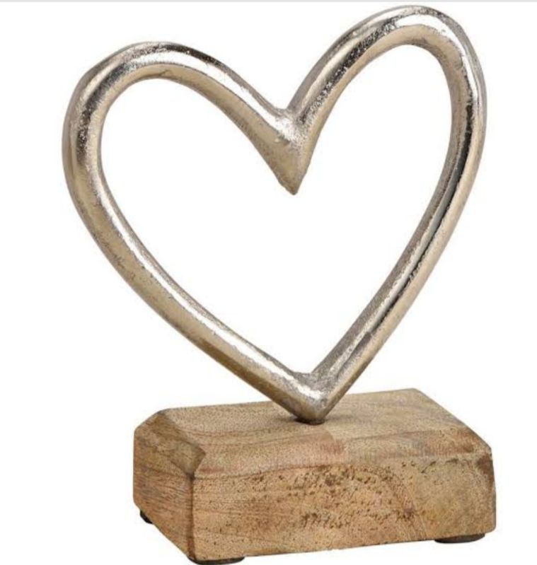 Silver Polished Metal Heart Shape Sculpture, for Interior Decor, Home, Gifting, Size : Multisize