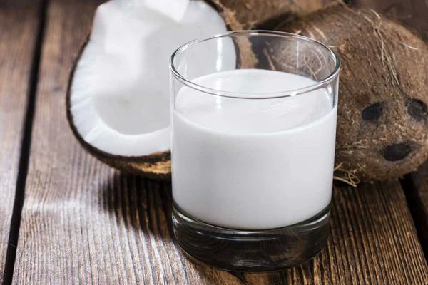 White Liquid Coconut Milk, for Human Consumption, Packaging Type : Plastic Pouch