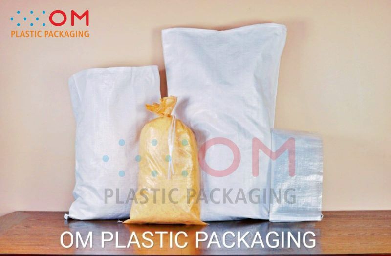 OM PLASTIC PACKAGING in Rajkot Manufacturer of Pp Woven Bags & fabric