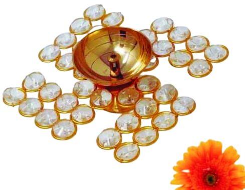 Brass Golden Swastik Crystal Diya, for Pooja, Size : Multisize