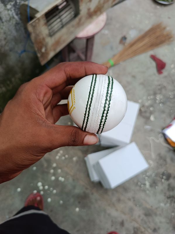 white cricket leather ball