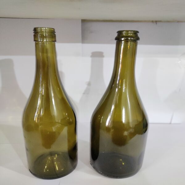 Champagne Glass Bottles, for Essential Oil, Feature : Eco Friendly, Fine Finished, Freshness Preservation