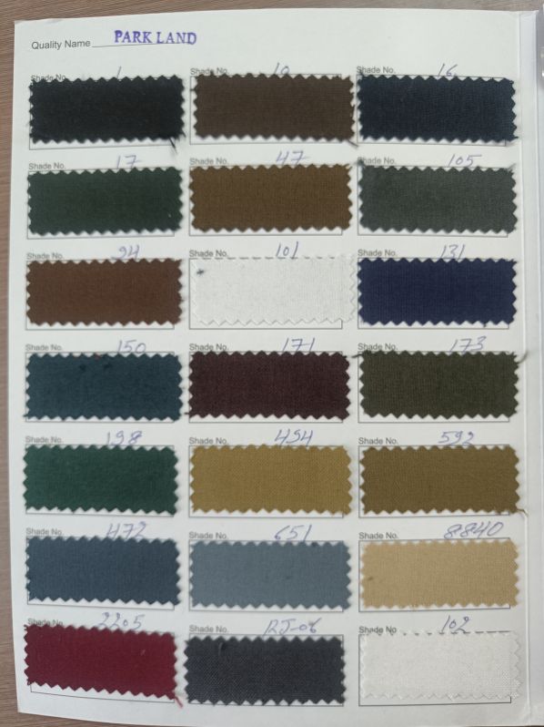 Polyester Suiting Fabric, For Garments, Pattern : Plain