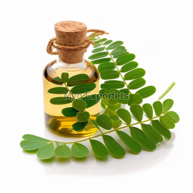 Liquid Moringa Oil, For Cosmetic Products, Packaging Type : Bottle