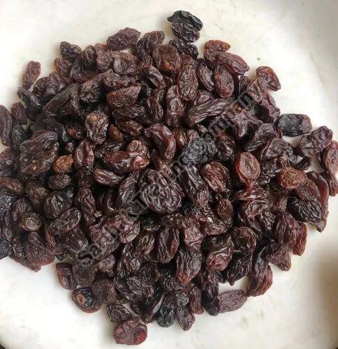 Dark Brown Dried Raisin, Taste : Sweet