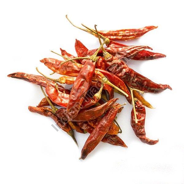 Dried Red Chilli with Stem, for Cooking, Packaging Type : Plastic Packet