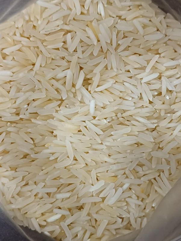 White sharbati steam rice, Form : Solid