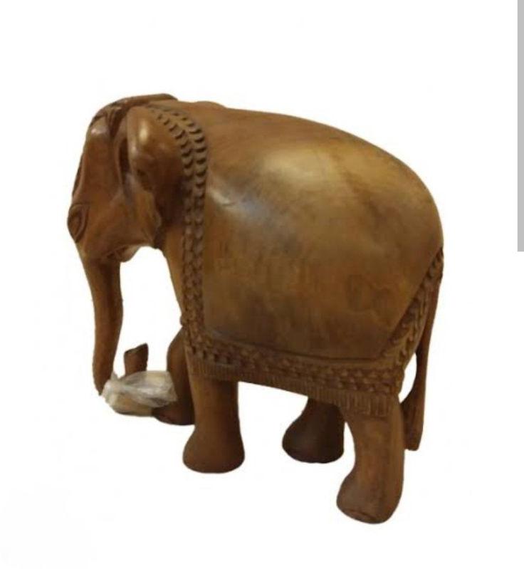 Brown Polished Carved Wooden Elephant, for Home Decor, Gifting, Style : Antique