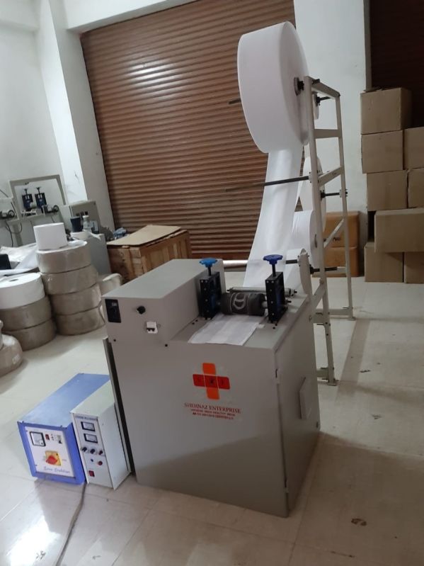 Grey Ultra Thin Sanitary Pad Making Machine, for Clinic, Hospital, Style : Disposable