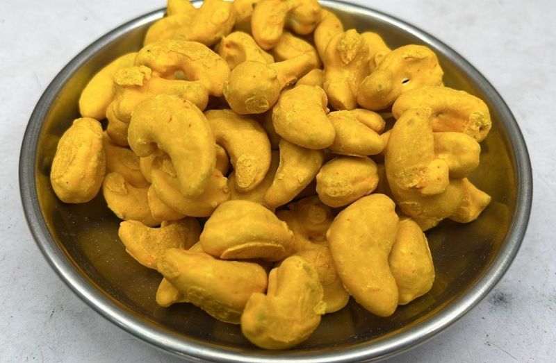 Whole Mango Flavoured Cashew Nuts, For Human Consumption, Taste : Sweet 