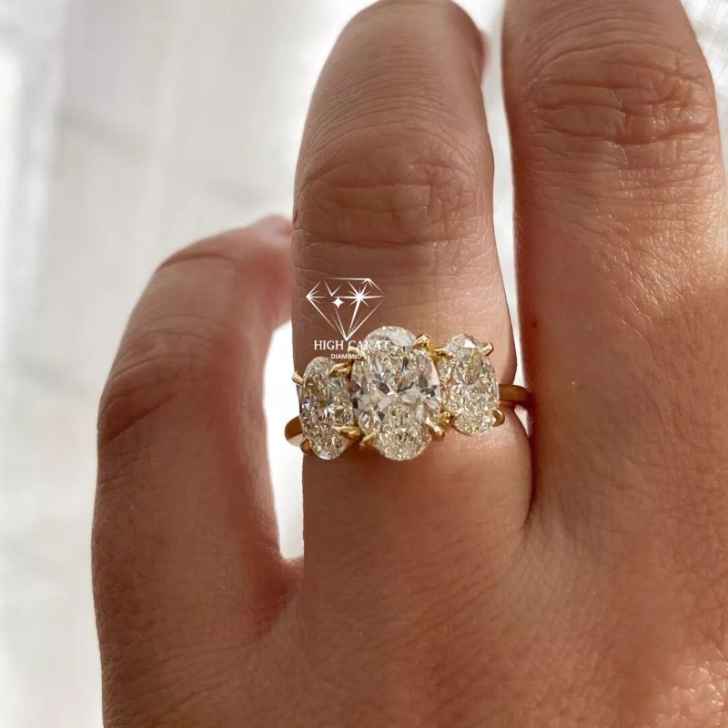 Oval Cut Three Diamond Engagement Ring