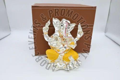 8 Inch Yellow and Silver Resin Ganesh Statue