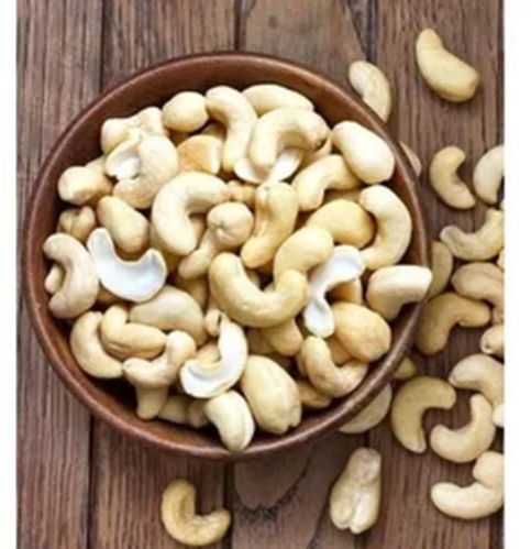 Natural Raw Cashew Nuts, Color : Beige, Packaging Size : 10kg, 5kg