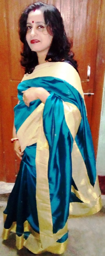 Green and Sky Blue Raw Silk with Golden Border Saree